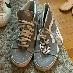 Gray and white Vans Sk8-Hi shoes